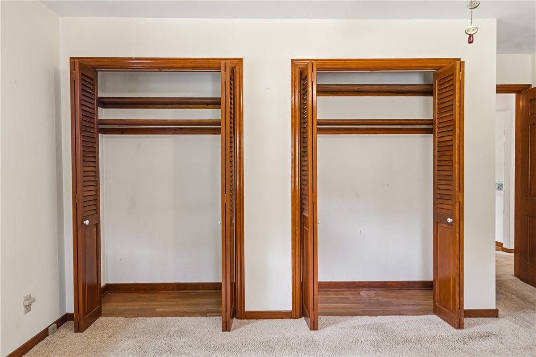 Double closets in the primary bedroom.