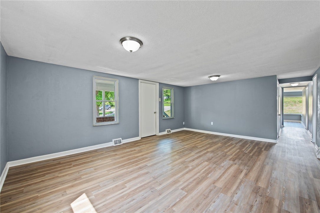 New flooring, fixtures and fresh paint throughout