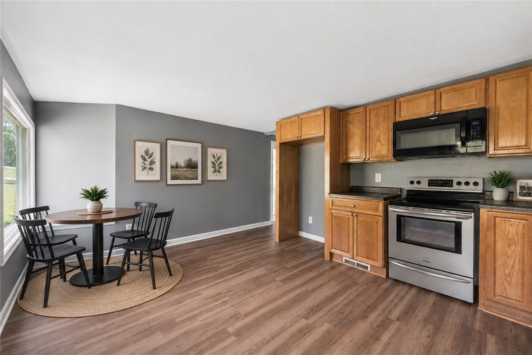 cozy corner perfect for dining table *virtually staged*