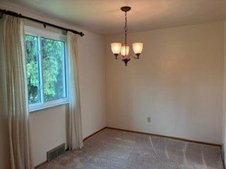 1120 O Block Road, Pittsburgh, PA 15239 Dining room filled with light adjacent to updated Kitchen