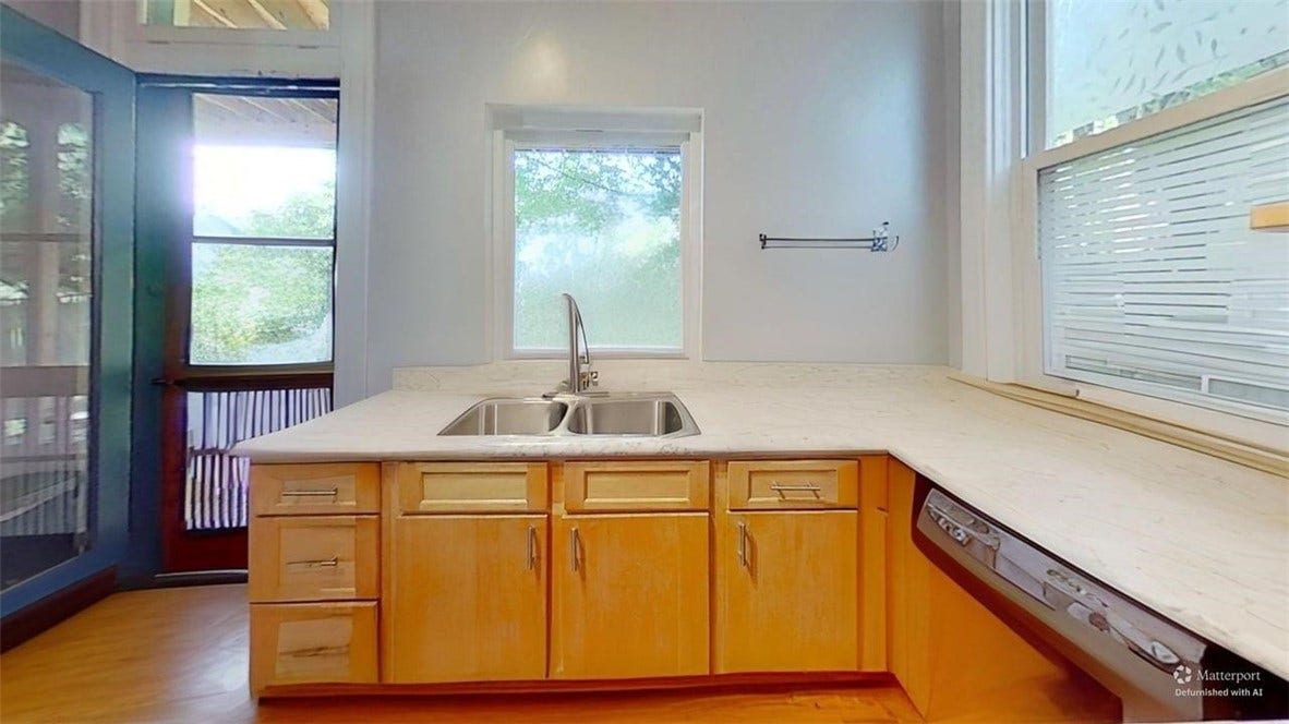 5546 Hays St, Pittsburgh, PA 15206 Beech or light oak cabinets, natural stone countertops, induction cook top and wall oven ( the original butler " back stair case " still exists in part behind the wall oven.