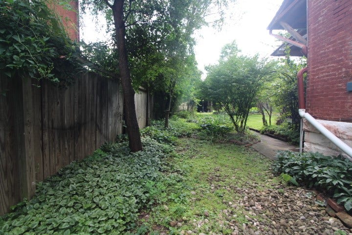 5546 Hays St, Pittsburgh, PA 15206 Left side of the home, through the gate and entering the garden and yard space.