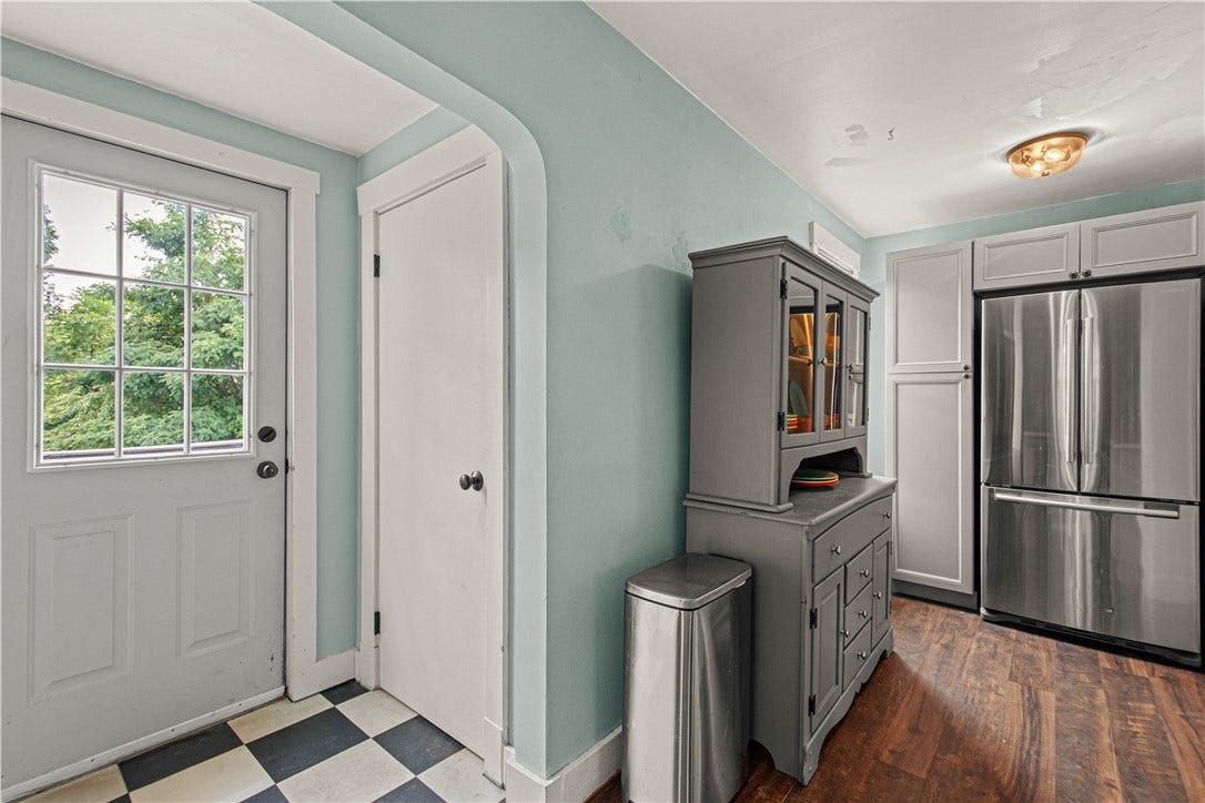 from kitchen step out to the deck or to basement level.