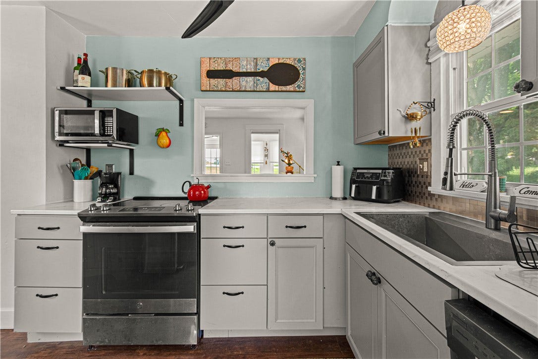 kitchen with large single basin stainless steel sink