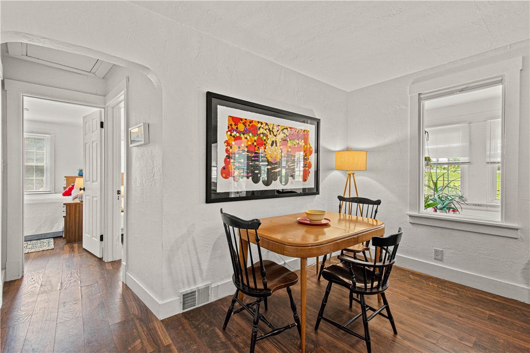 Dining area with hallway to bath and bedrooms
