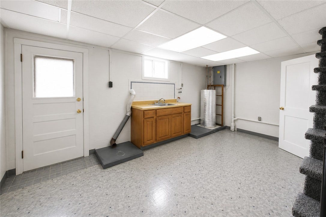 Laundry room with storage and hookups! 17X13