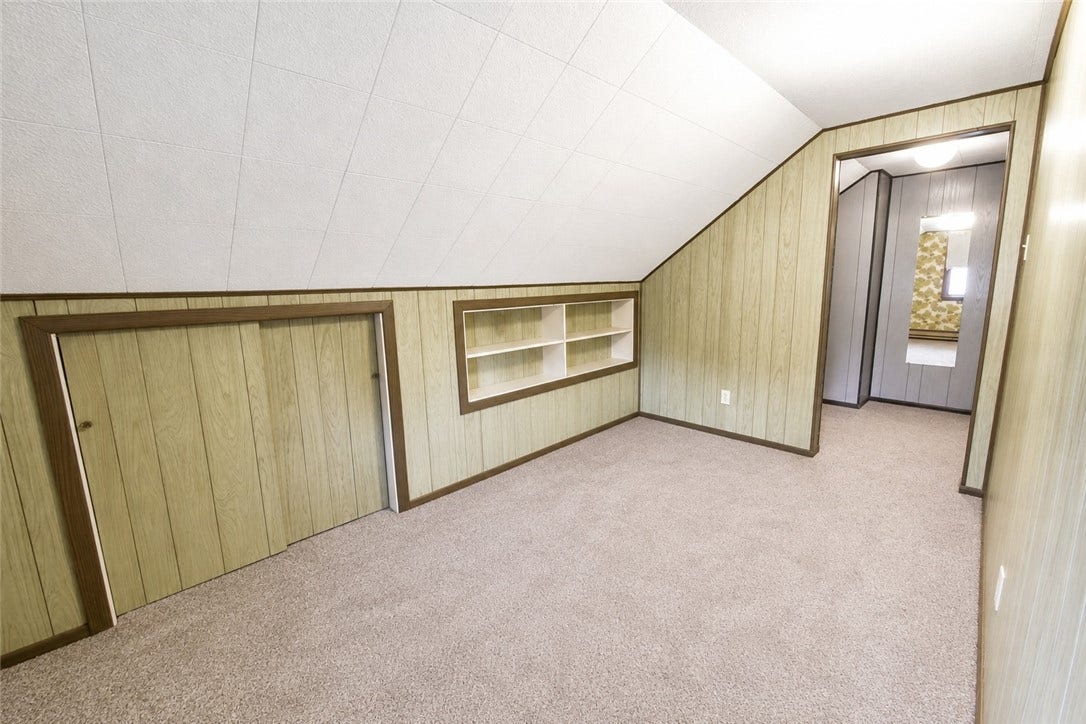 An extra space on the upper floor with lots of storage to make your own! 13x8
