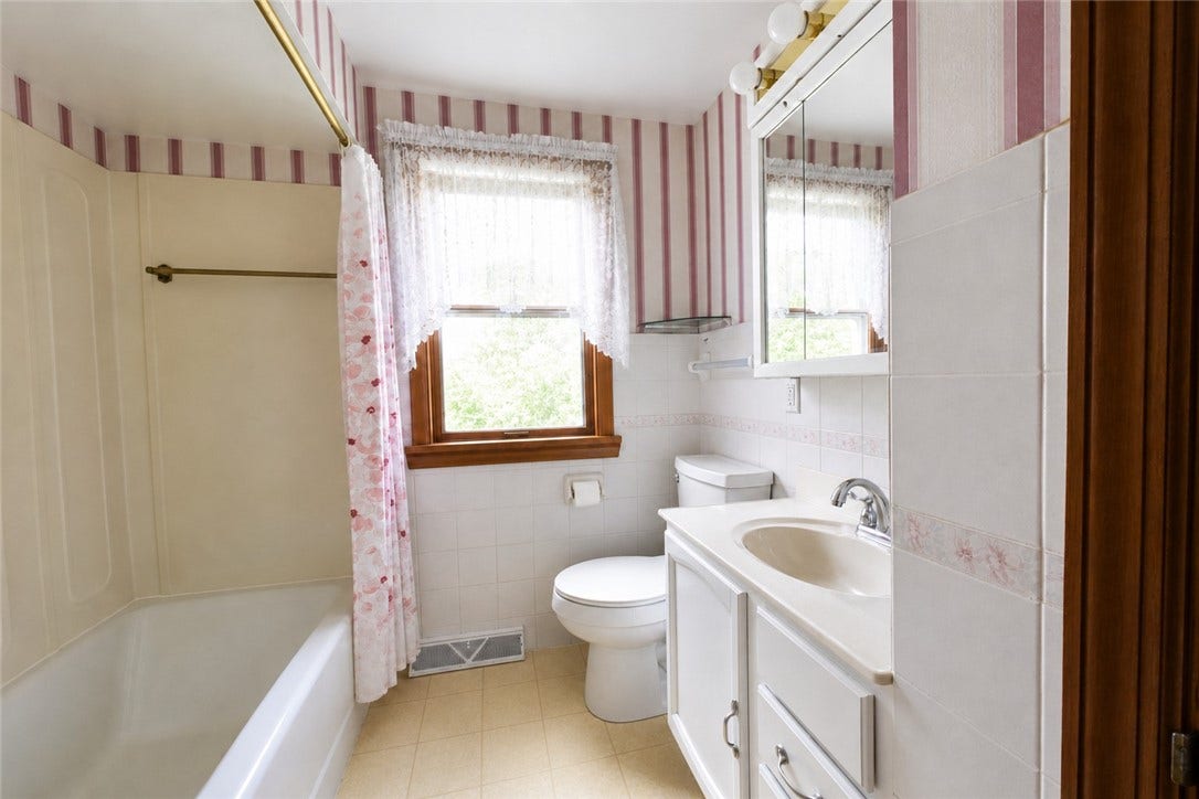 Full bathroom on the main floor with a closet for storage!