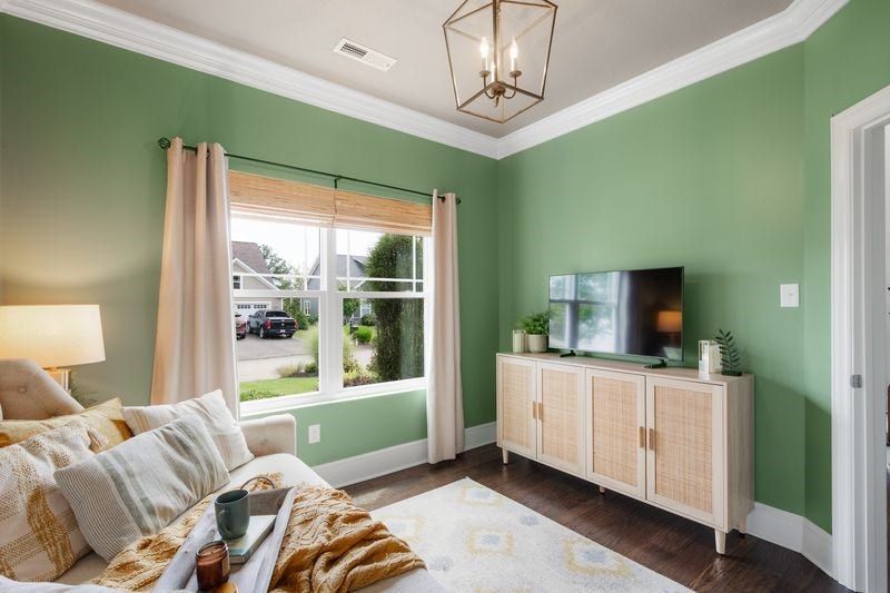 A relaxing, soothing color choice includes a 15-lite door.