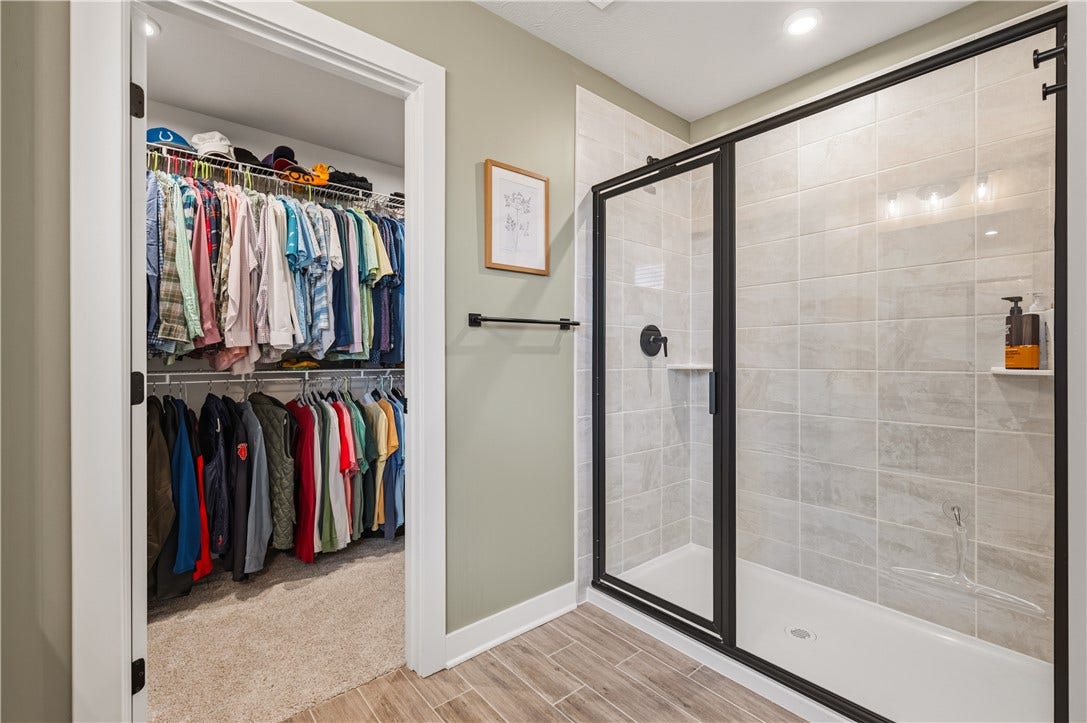 Extra large shower and additional walk-in closet