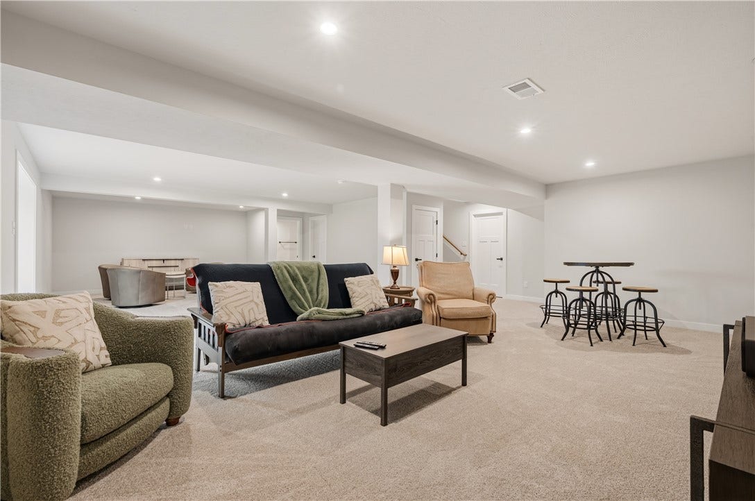 Finished basement, plumbed for wet bar or kitchenette