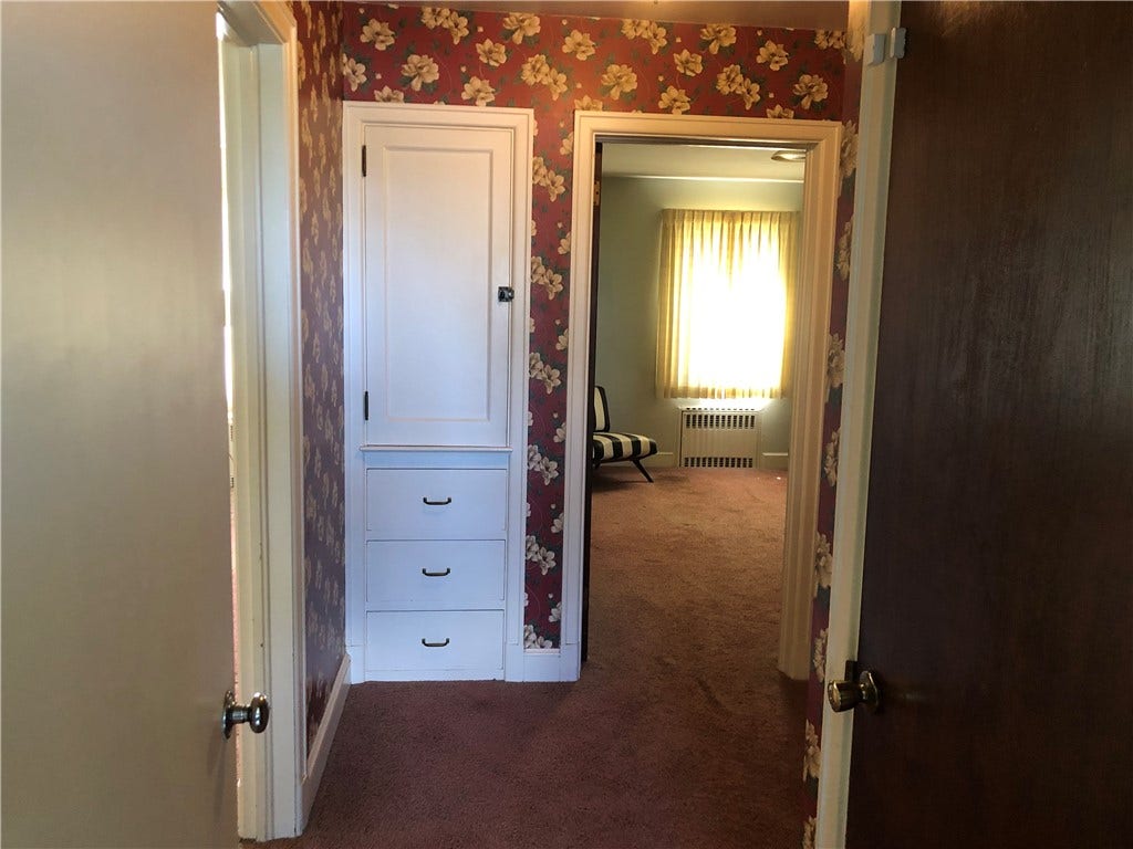 Main level built in cupboard with drawers