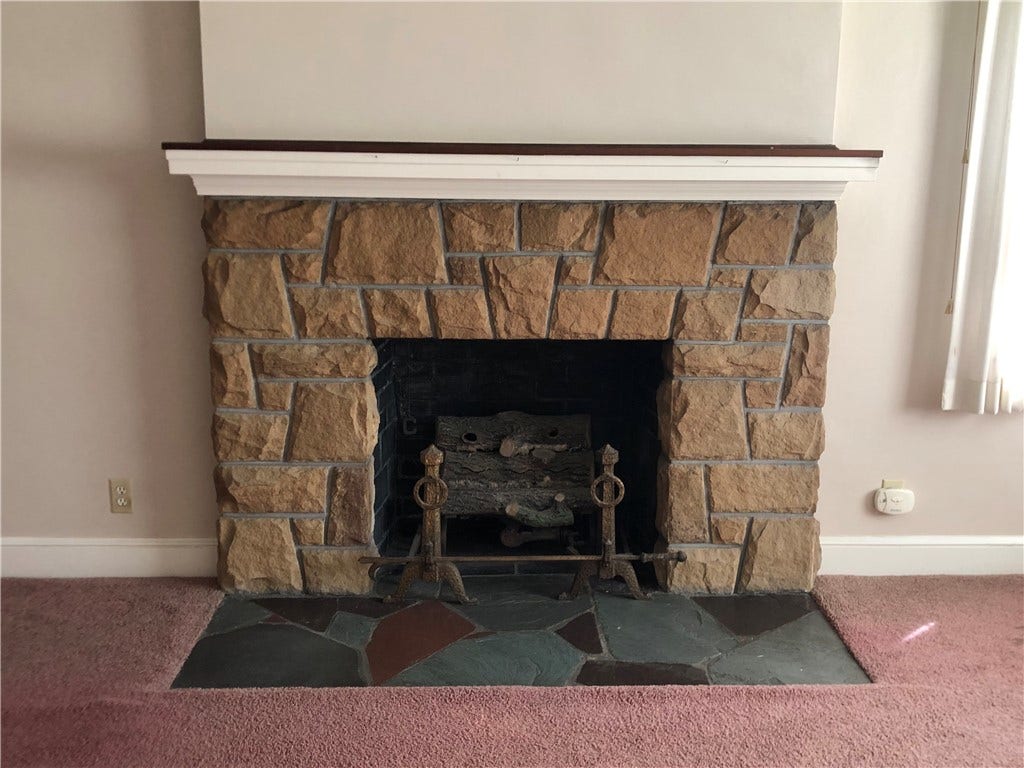 The keystone is displayed on the gas firplace