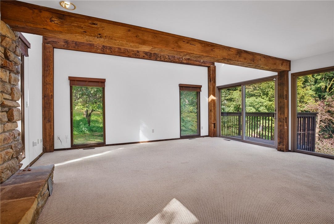 Beamed ceilings add warmth and character.