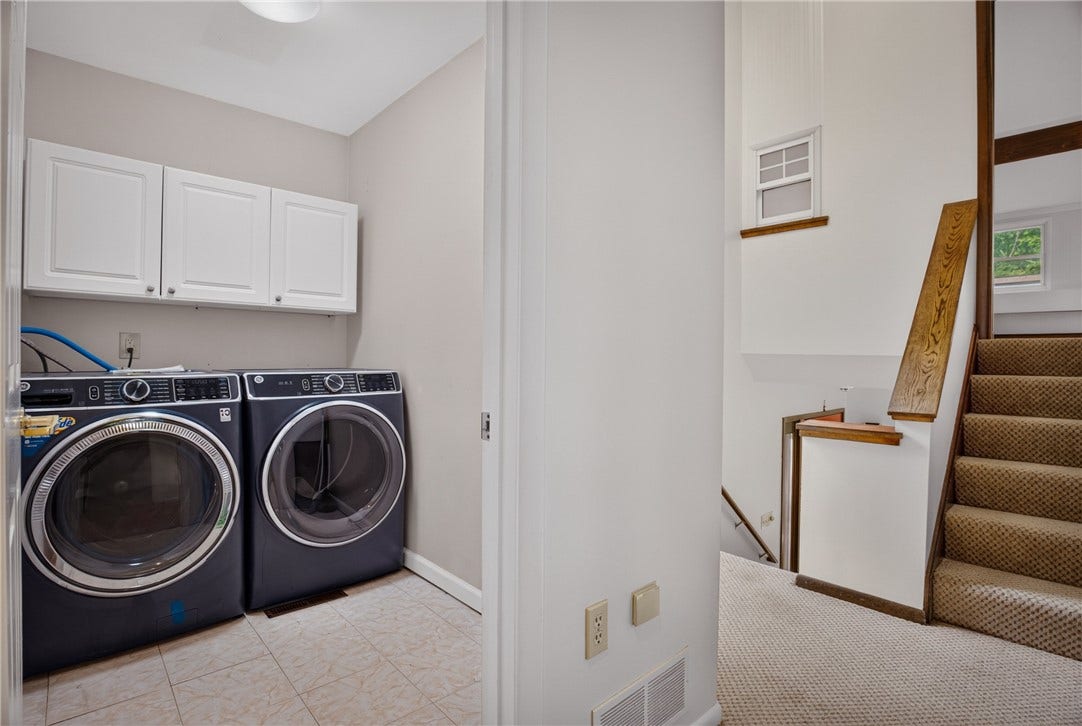 Convenient second-floor laundry adds ease to everyday living.