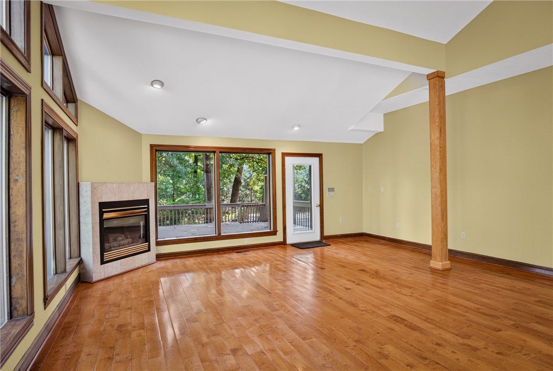 Direct access connects the family room to the wraparound deck.