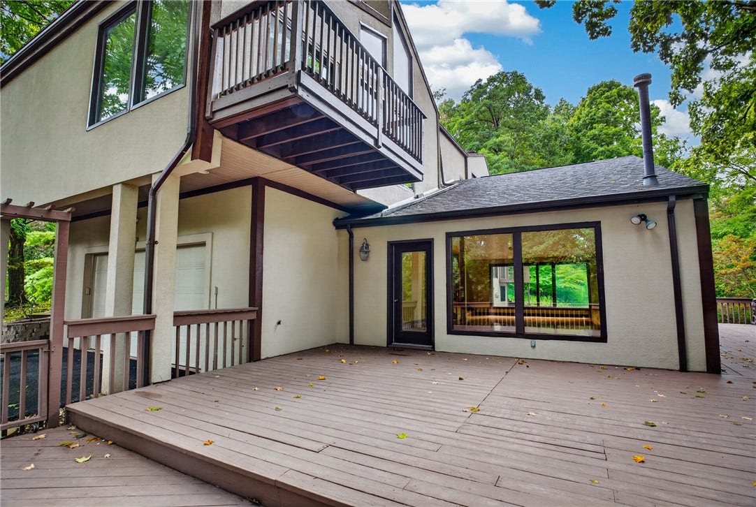 The expansive wraparound deck is ideal for outdoor entertaining.