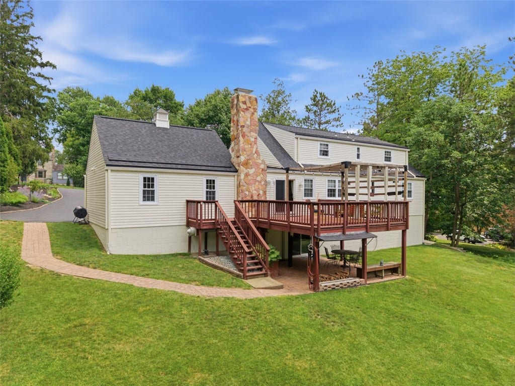 1820 Kent Road, Pittsburgh, PA 15241 Deck along with a covered patio in the back of the home.
