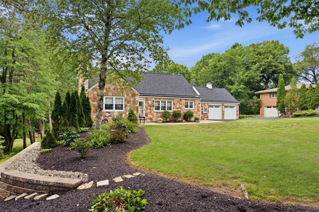 1820 Kent Road, Pittsburgh, PA 15241 Professionally landscaped and so inviting. Welcome to 1820 Kent Road.