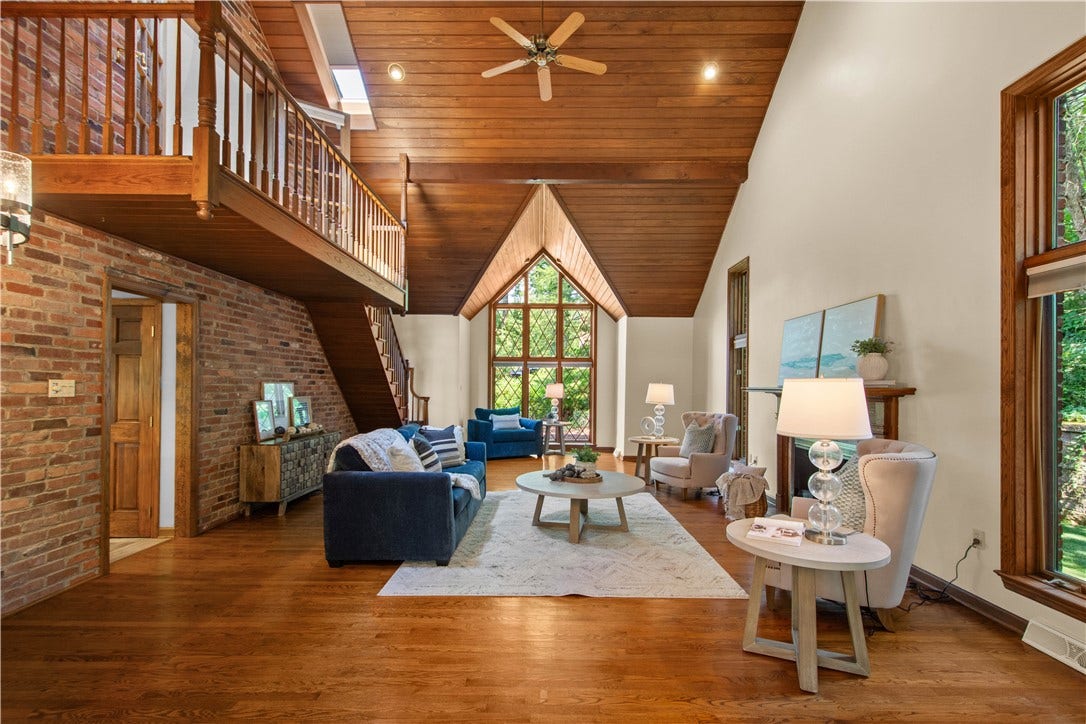 The fireplace adds warmth and character to a spectacular space.