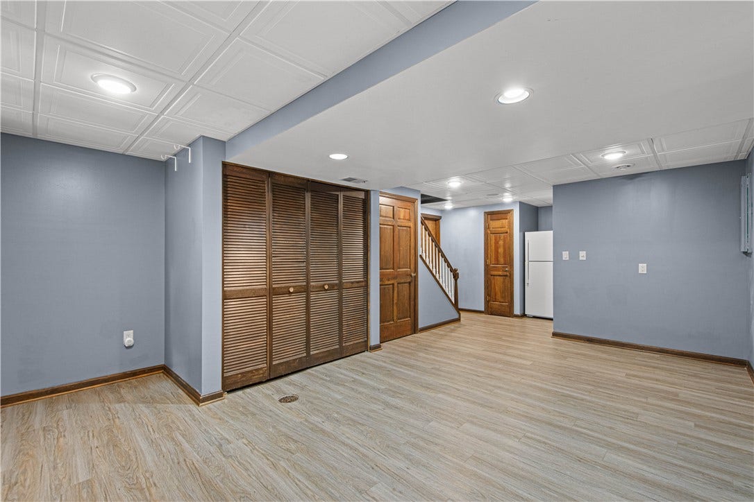 Access to the garage, a full bath and utilities with plenty of storage options.