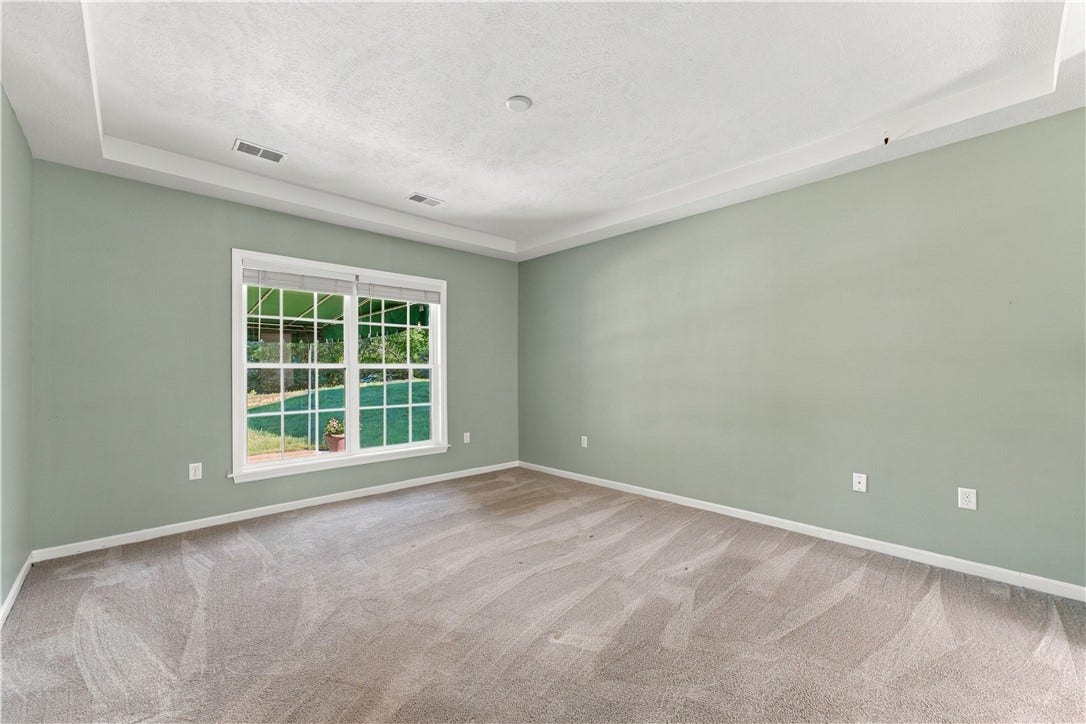Spacious Primary Bedroom with Trey Ceiling