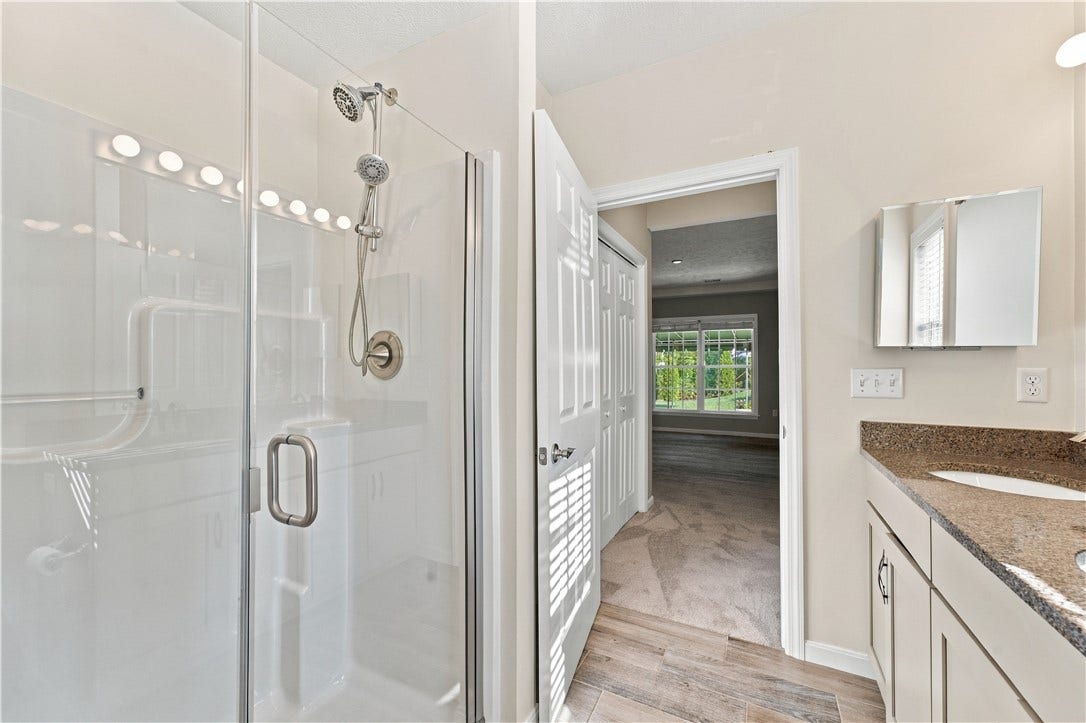 And an Oversized Walk-In Shower with Seat