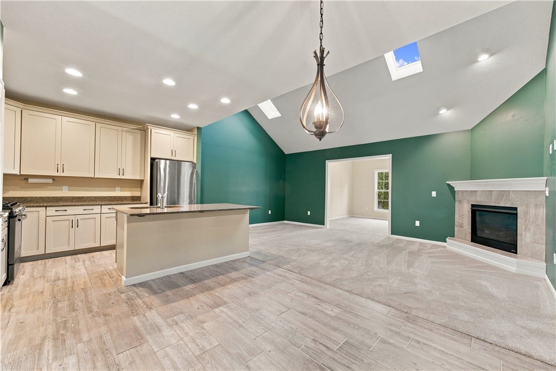 Showcases the Open Floorplan Between the Kitchen, Dining Area and Great Room
