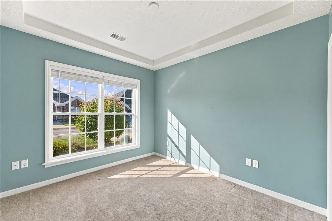 Guest Bedroom with Trey Ceiling and Fresh Paint Color