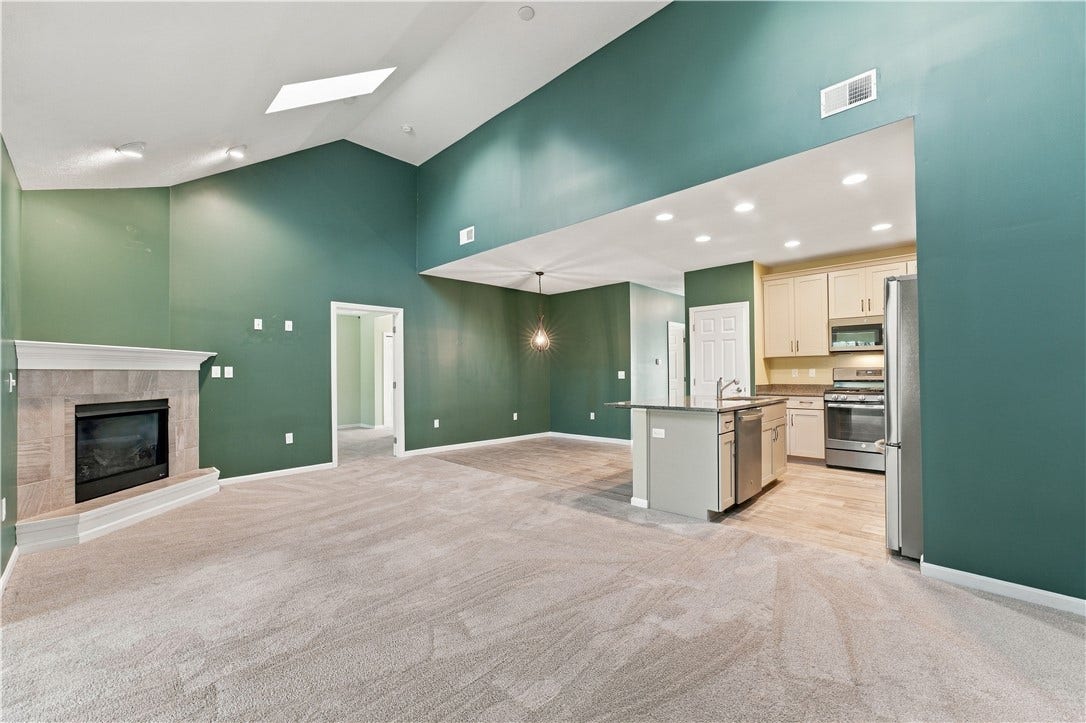 The Great Room has a Soaring Ceiling with Two Skylights for Added Natural Light