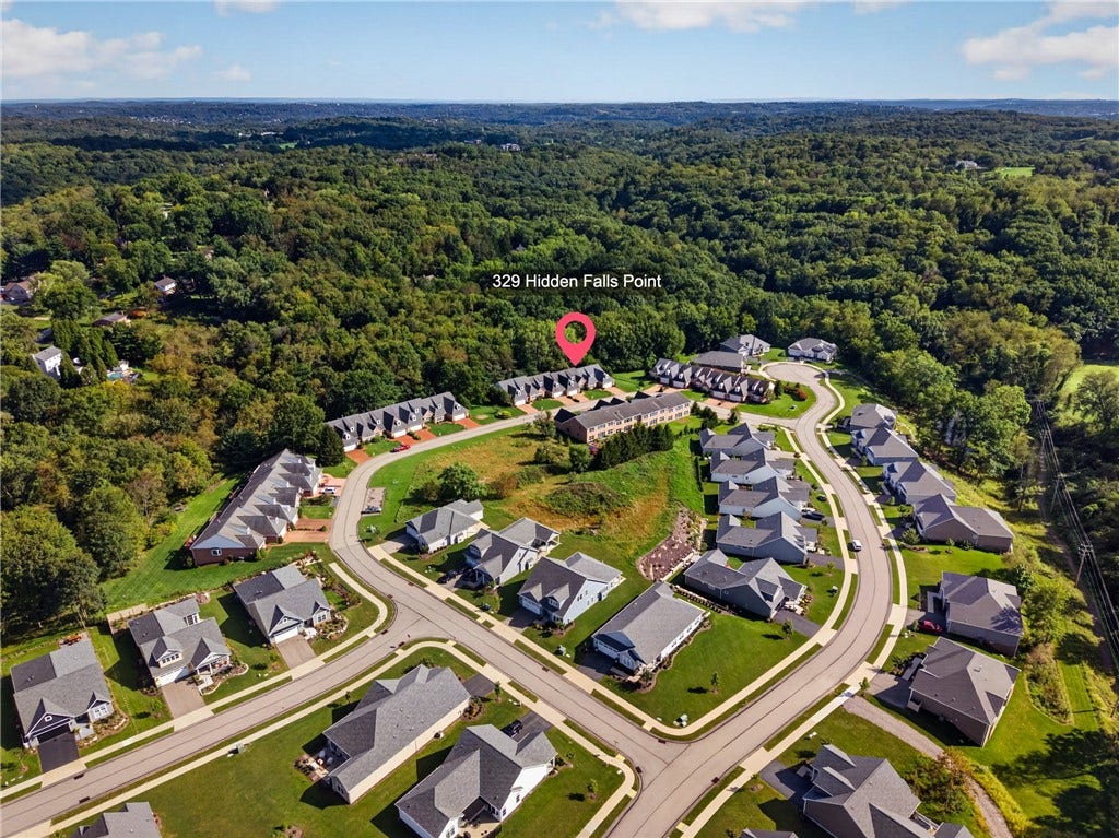 ENJOY PRIVACY OF A WOODED SETTING WHILE REMAINING CLOSE TO EVERYTHING FOX CHAPEL HAS TO OFFER.