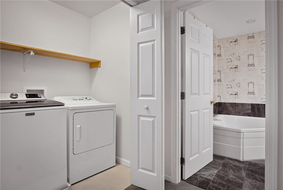 MAIN LEVEL LAUNDRY KEEPS EVERYDAY HOUSEHOLD TASKS WITHIN EASY REACH.