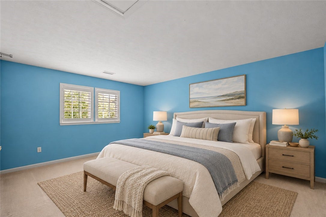 One of 2 second floor bedrooms.