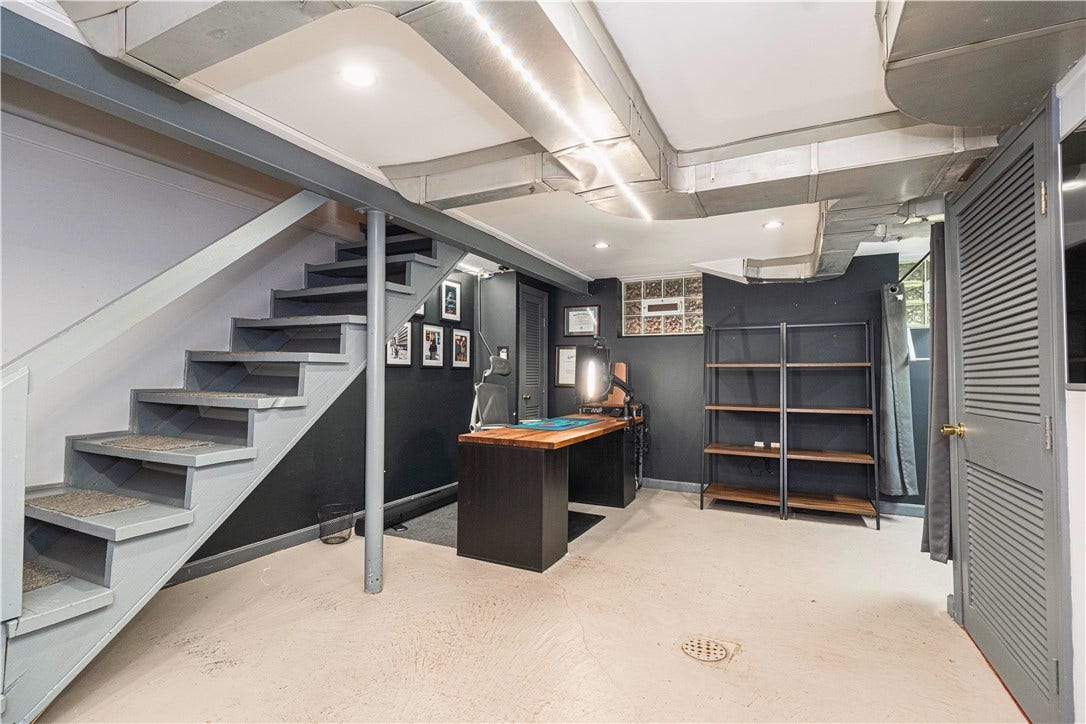 Approximately 300 additional square feet of unfinished basement space with laundry area and plenty of room for flexible use.