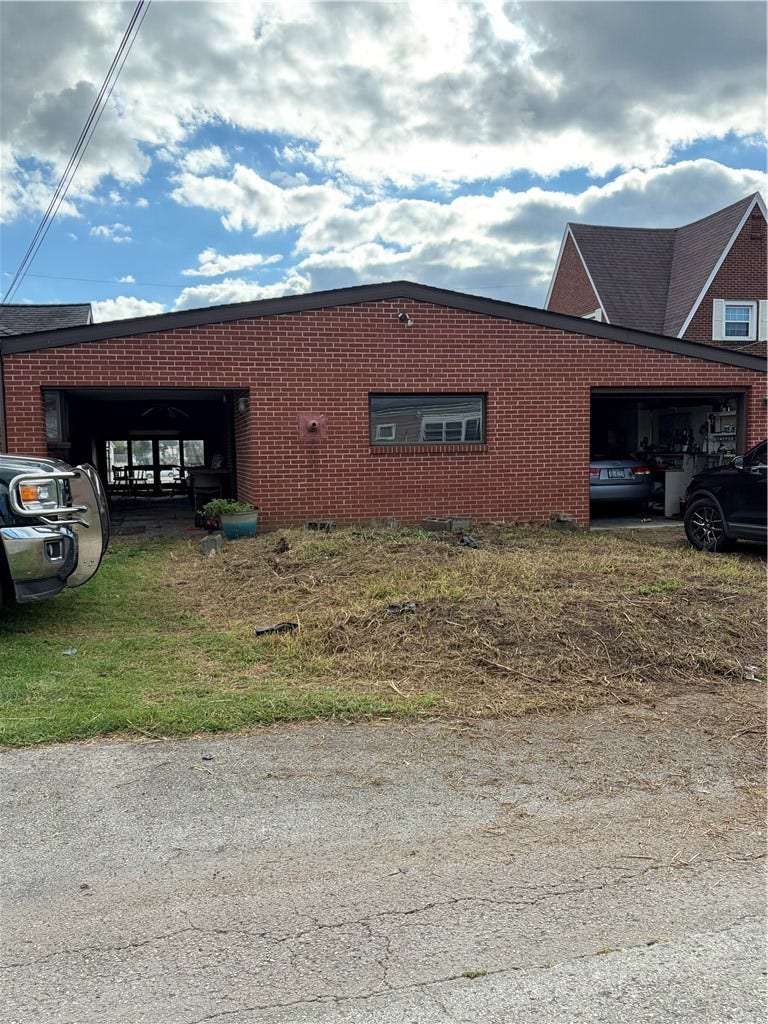 View of Breezeway and 2 Car Garage