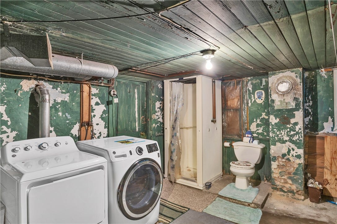 524 8th St, Irwin, PA 15642 Washer, dryer, freezer along with a Pittsburgh potty and a shower