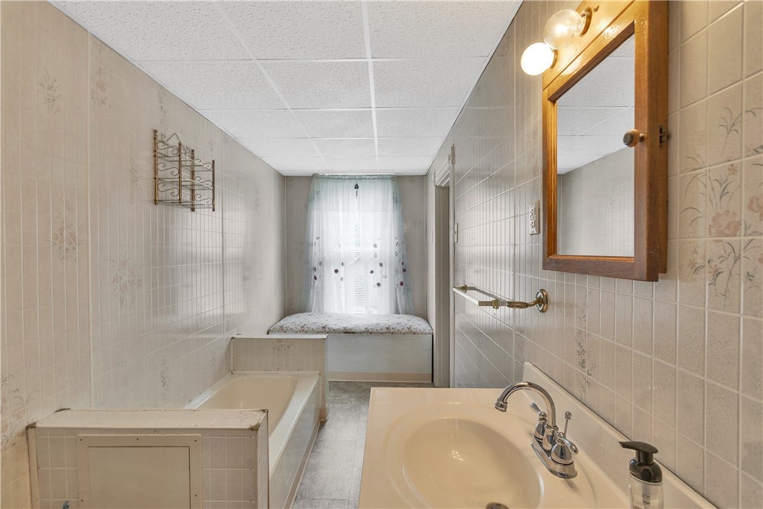 Accessible by both bedrooms