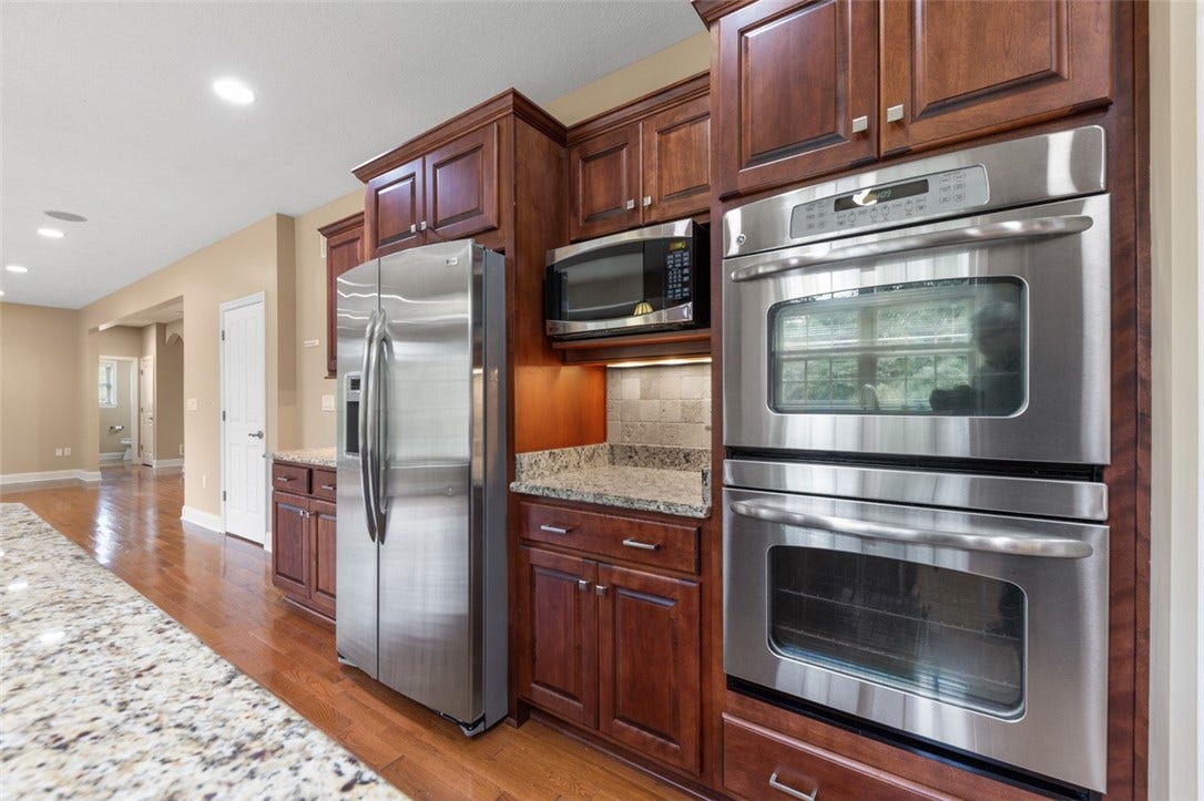 Double Oven Microwave and Stainless Refrigerator