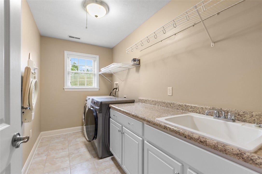 2nd floor Laundry with built in ironing board