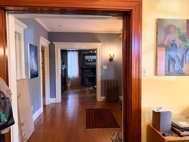 View from Salon through foyer into the den