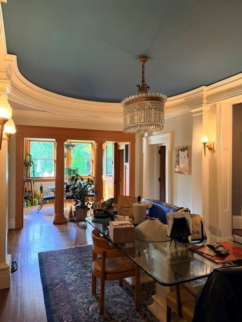 Gorgeous tray ceiling and architectural mill work makes this room stately