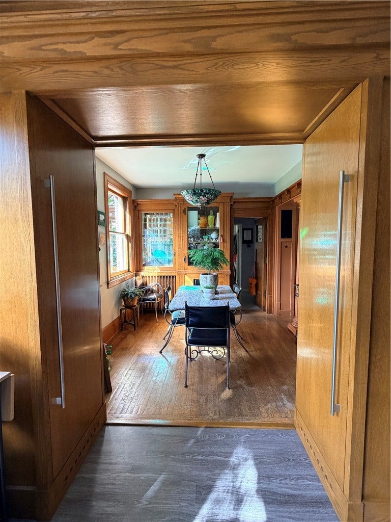 The built-in refrigerator and separate freezer on the right and left.