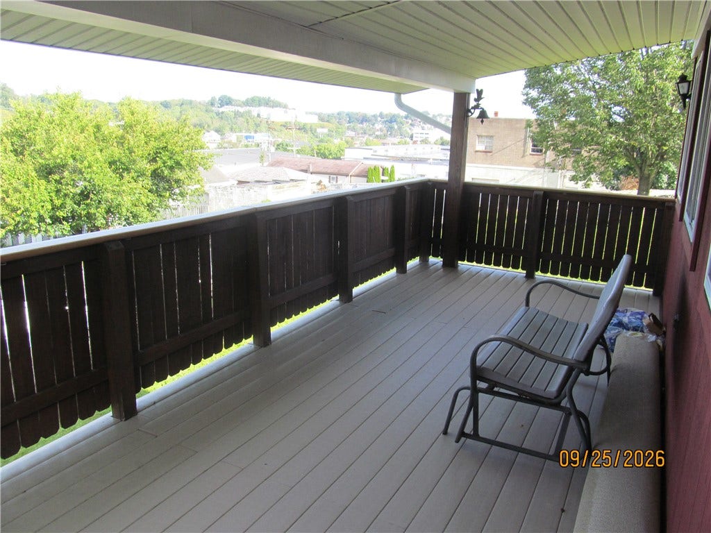 Raised deck in rear of house