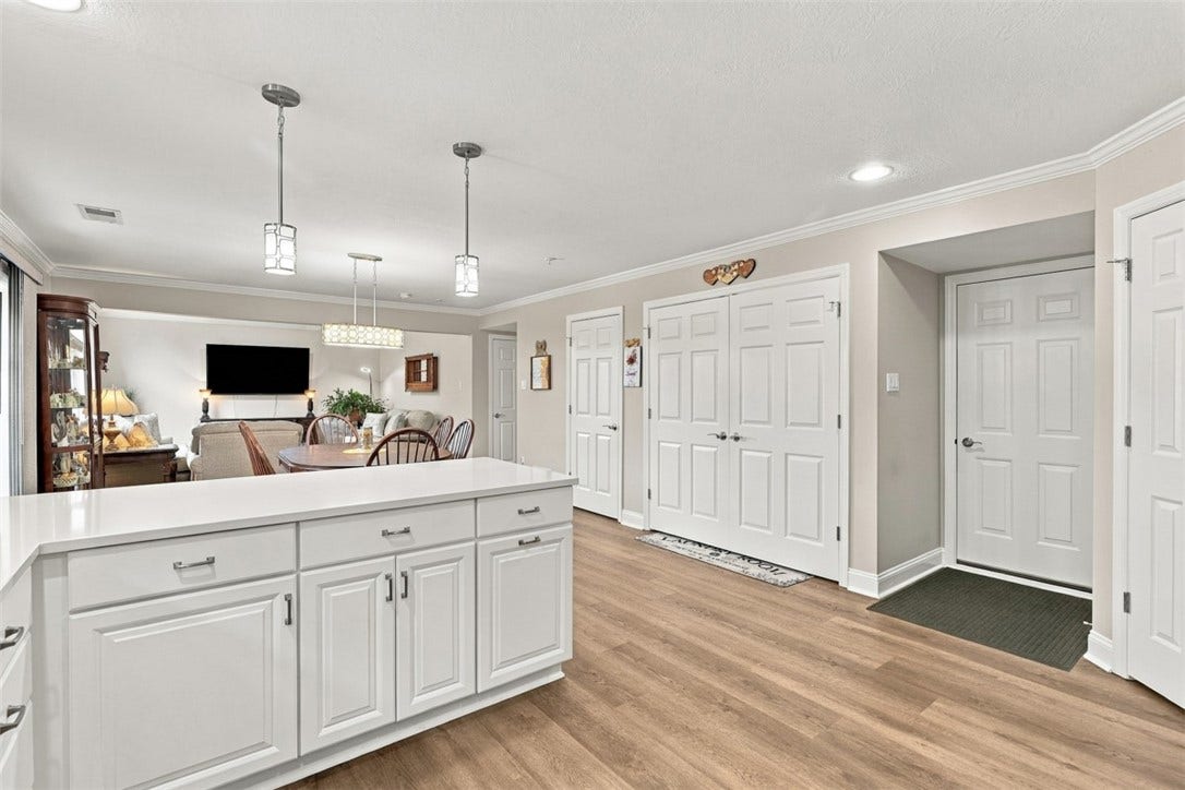 Direct garage access to the kitchen makes unloading groceries quick and convenient.