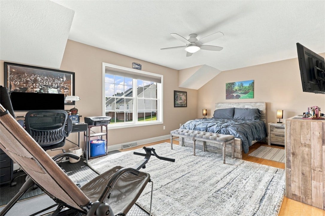 Extra-large Bedroom #2 features an oversized window, walk-in closet and direct access to the Jack-and-Jill bath.