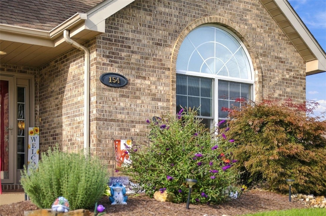 Palladian window adds abundant natural light.