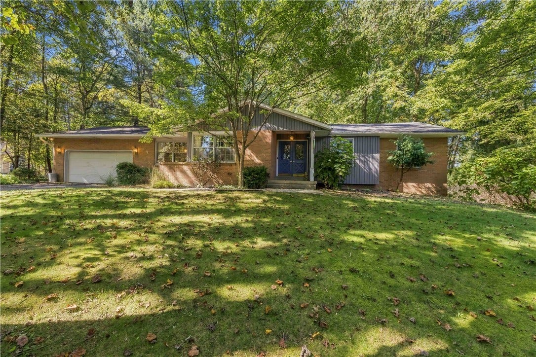 Brick ranch with attached 2 car garage