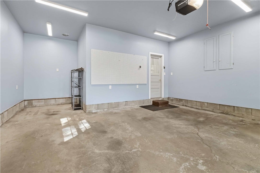 2 car attached garage. HIGH CEILINGS!!