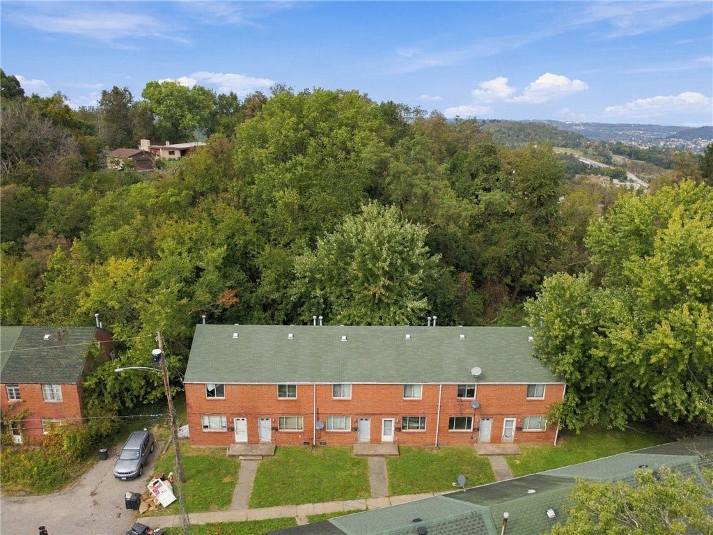 2501 Lincoln Ave, Clairton, PA 15025 Front ariel view of six-unit rowhouse investment property.