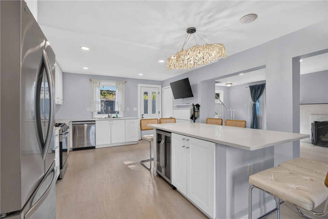 Kitchen (25x13), island includes wine fridge & ample seating